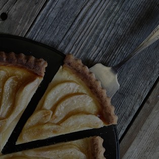 Slice of pear pie being served.